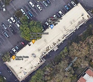 Santa Barbara apartment for rent - a aerial view of a parking lot and a building