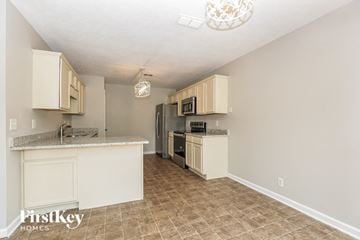 Murfreesboro house for rent - a kitchen with a counter top and a refrigerator