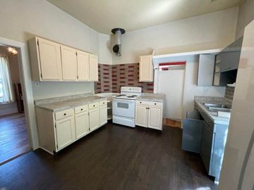 La Veta house for rent - a kitchen with a stove and a sink