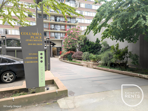 Vancouver apartment for rent - A sign for Columbia Place apartments is displayed in front of a building.