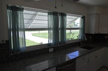 Cape Coral house for rent - a kitchen with a sink and a window