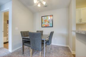 Omaha apartment for rent - a dining room with a table and chairs
