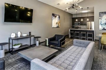 Omaha apartment for rent - a living room with a couch and a table
