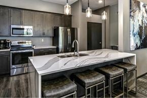 Omaha apartment for rent - a kitchen with a marble counter top