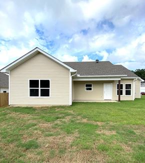 Benton house for rent - the front of a house with a yard in front of it