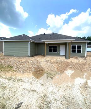 Benton house for rent - a house with a dirt lot in front of it