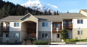 Seward apartment for rent - Apartment complex with a mountain in the background.
