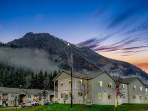 Seward apartment for rent - A mountain with a building in front of it.