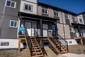 Regina apartment for rent - A building with a staircase leading to the entrance.