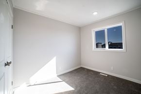 Regina apartment for rent - A room with a window and a door.