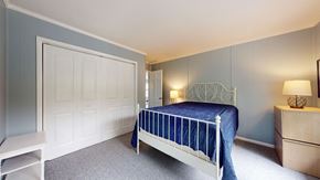 Emerald Isle house for rent - a bedroom with a bed and a closet