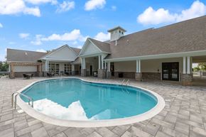 Elizabethtown apartment for rent - a swimming pool in front of a house with a pool