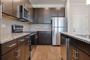 Elizabethtown apartment for rent - a large kitchen with stainless steel appliances and marble counter tops