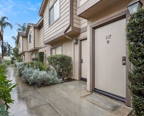 Redlands apartment for rent - A row of houses with the number 117 on the front door.