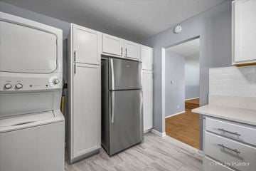 Country Club Hills house for rent - a kitchen with white cabinets and a stainless steel refrigerator
