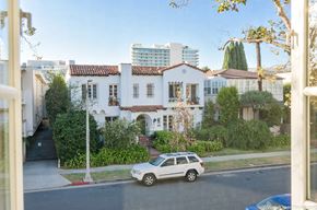 Beverly Hills apartment for rent - a white car parked in front of a house on a street