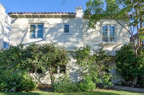 Beverly Hills apartment for rent - a white house with trees in front of it