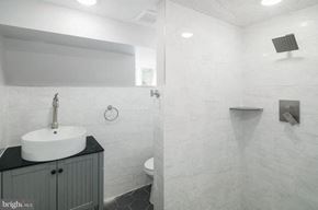 Philadelphia apartment for rent - a white bathroom with a sink and a toilet