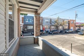 Philadelphia apartment for rent - a view of the street from the front of a building