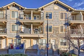 Calgary house for rent - A large building with multiple balconies and windows.