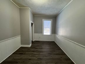 Louisville apartment for rent - A room with a window and a door.