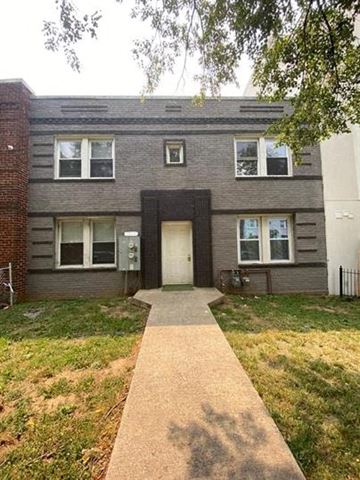 Washington apartment for rent - a house with a sidewalk in front of it