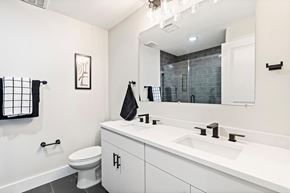 Newark apartment for rent - a bathroom with a sink and a toilet and a mirror