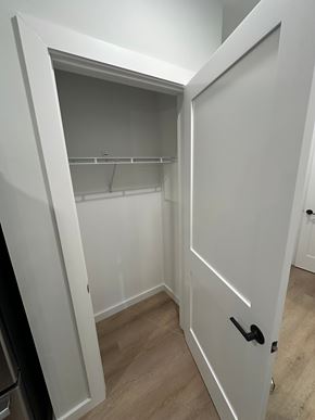 Warwick apartment for rent - A white door is open to a small closet.
