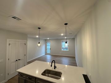 Warwick apartment for rent - A kitchen with a sink and a window.