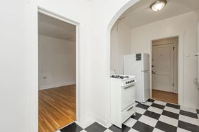 Denver apartment for rent - A black and white checkered floor in a kitchen.