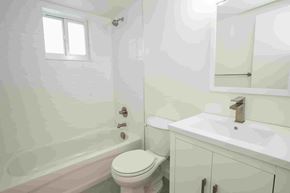 Miami apartment for rent - a bathroom with a sink and a toilet and a shower