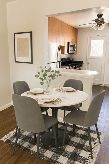 San Jose apartment for rent - A dining room with a white table and chairs.
