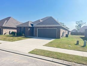 Lafayette house for rent - a house with a driveway and a garage door