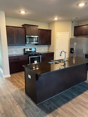 Youngsville house for rent - a kitchen with a large island in the middle