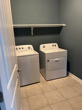 Youngsville house for rent - a laundry room with two washes and a dryer
