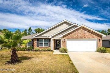 Ocean Springs house for rent - a brick house with a white garage door