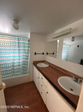 Interlachen house for rent - a bathroom with two sinks and a large mirror