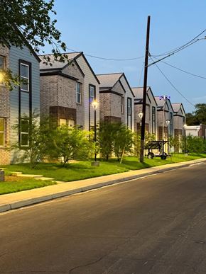 San Antonio apartment for rent - A street view of a residential area with houses on both sides.