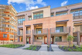 Sunnyvale house for rent - a brick building with two balconies and a sidewalk