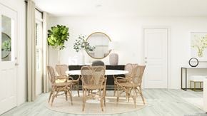 San Antonio house for rent - a dining room with a round table and rattan chairs    and a