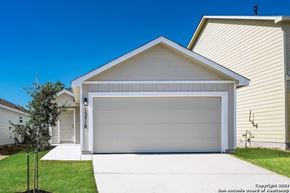San Antonio house for rent - a white garage door in front of a house