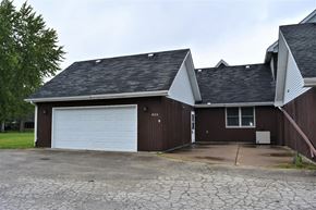 Crown Point apartment for rent - a garage with a white door in front of a house