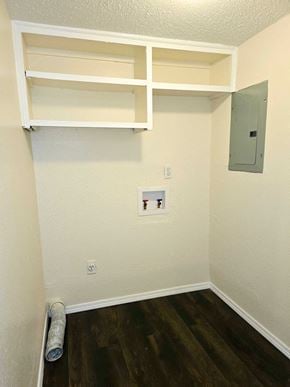 Atoka apartment for rent - A room with a white wall and a wood floor.