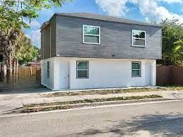 Fort Lauderdale apartment for rent - A two-story house with a grey exterior and white trim.