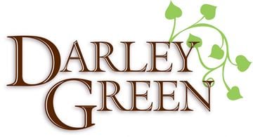 Wilmington apartment for rent - A logo with the words "Darley Green" in a brown serif font with a green vine graphic to the right.