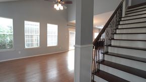Mesquite house for rent - the view from the bottom of the stairs looking into the living room and dining room