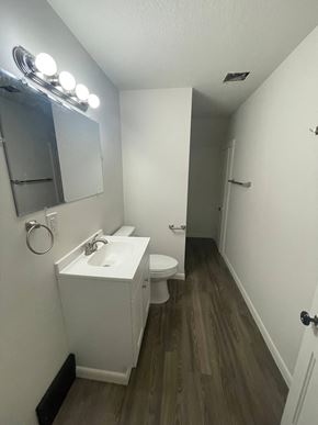 Lima apartment for rent - A bathroom with a white sink and toilet.
