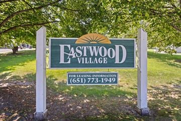 Oakdale apartment for rent - A sign for Eastwood Village with a phone number for leasing information.