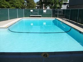 Surrey apartment for rent - Swimming pool number 4 is empty and ready for swimmers.