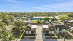 Houston apartment for rent - an aerial view of a neighborhood with houses and trees
